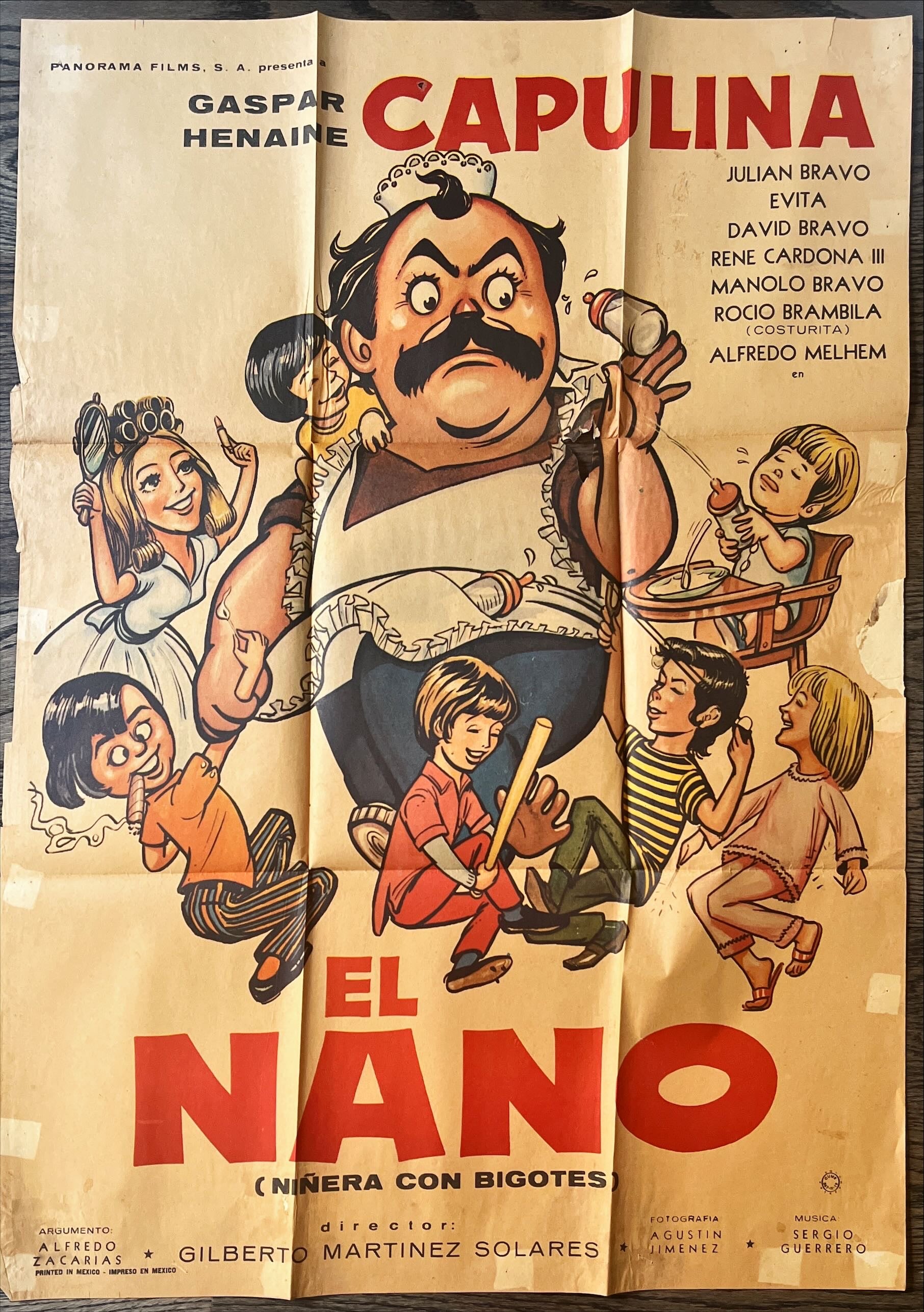 El Nano Mexican poster '71 wacky artwork of Gaspar Henaine surrounded by kids