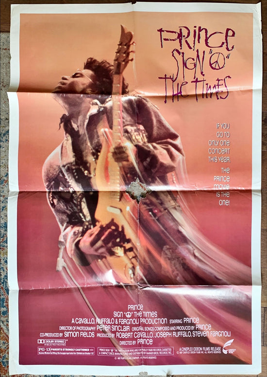 Signs of the Times, sh 1987 rock and roll concert, great image of Prince w/guitar